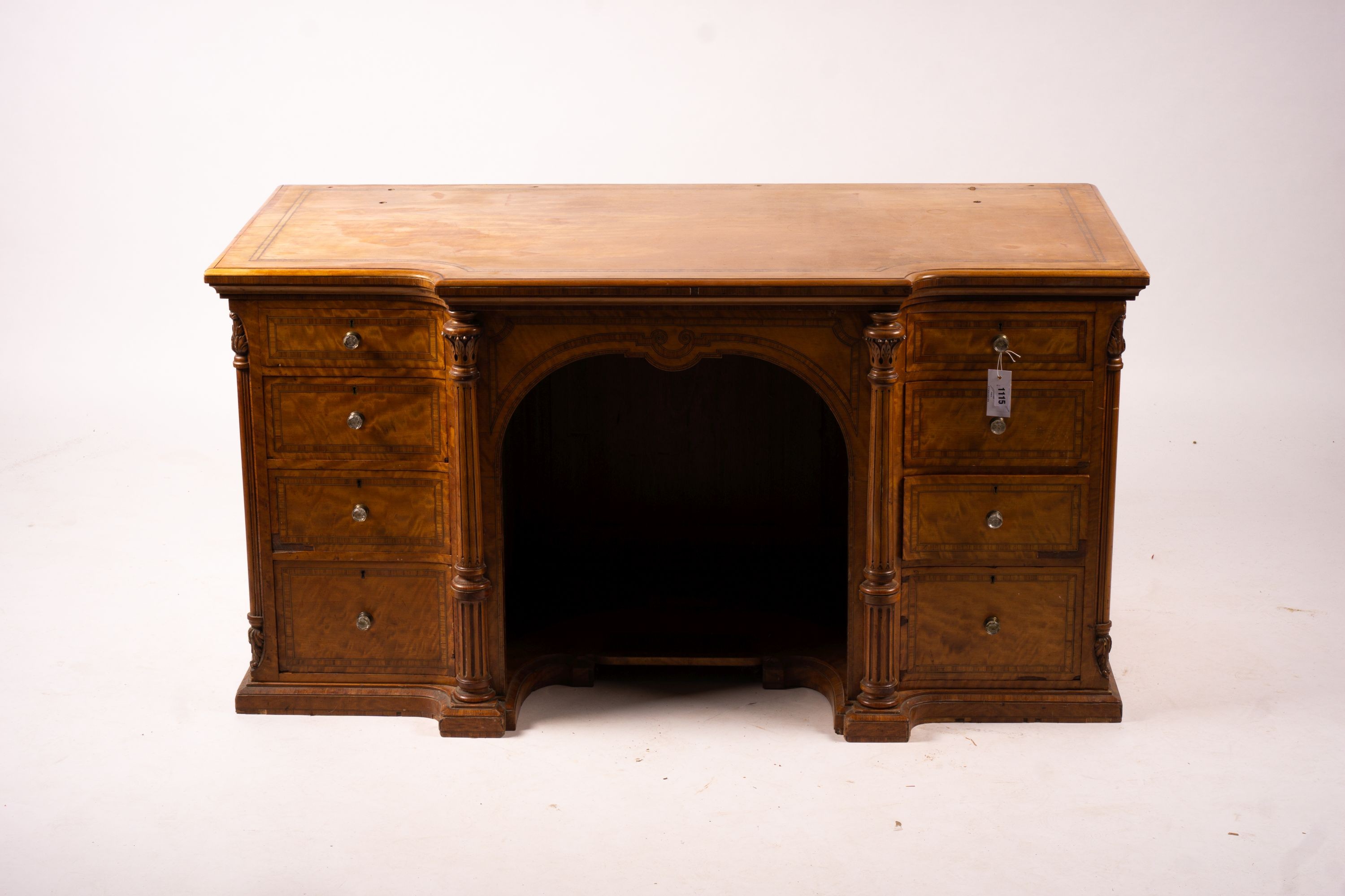 A late Victorian banded satinwood kneehole desk, width 138cm, depth 67cm, height 71cm